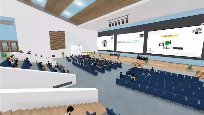 Virtual conference room with attendees, speakers on stage, and presentation slides.