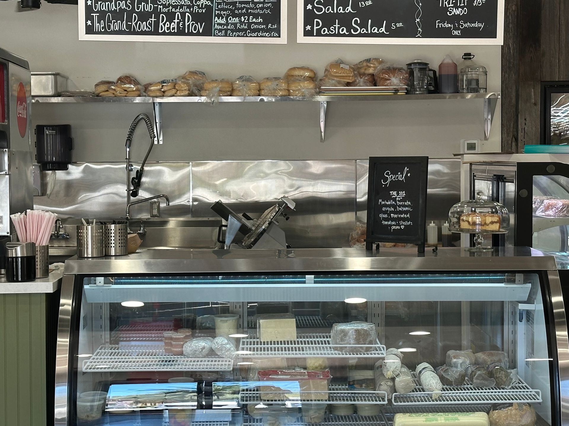 Clean professional deli counter at Gandolfo Family Market & Deli
