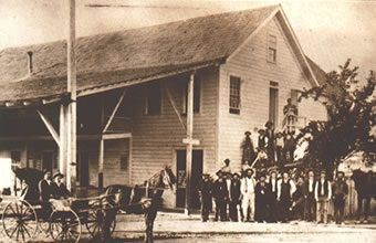 Historic photo of the Smith Flat House, early architecture preserved.