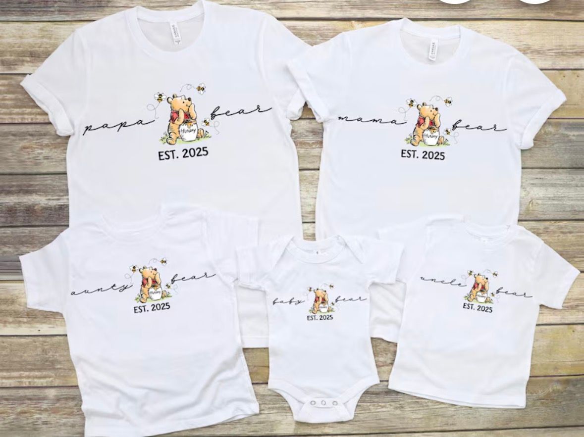 White family matching shirts with a cow graphic and 