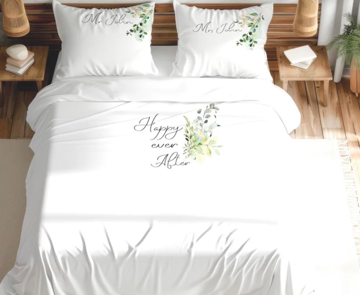 White bed with matching pillowcases, 