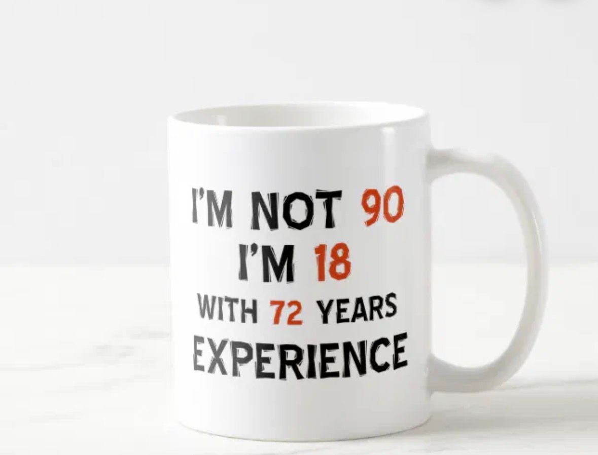 White mug with text: 