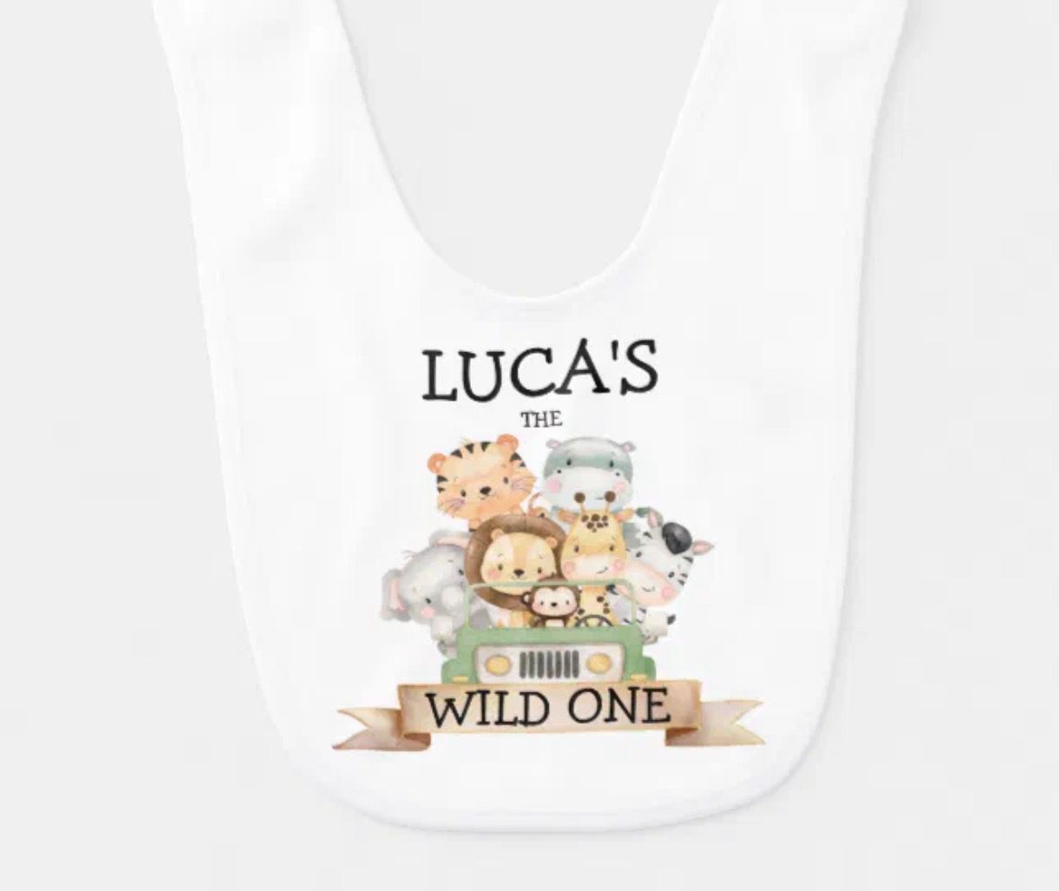 Baby bib with cartoon safari animals and text that says 
