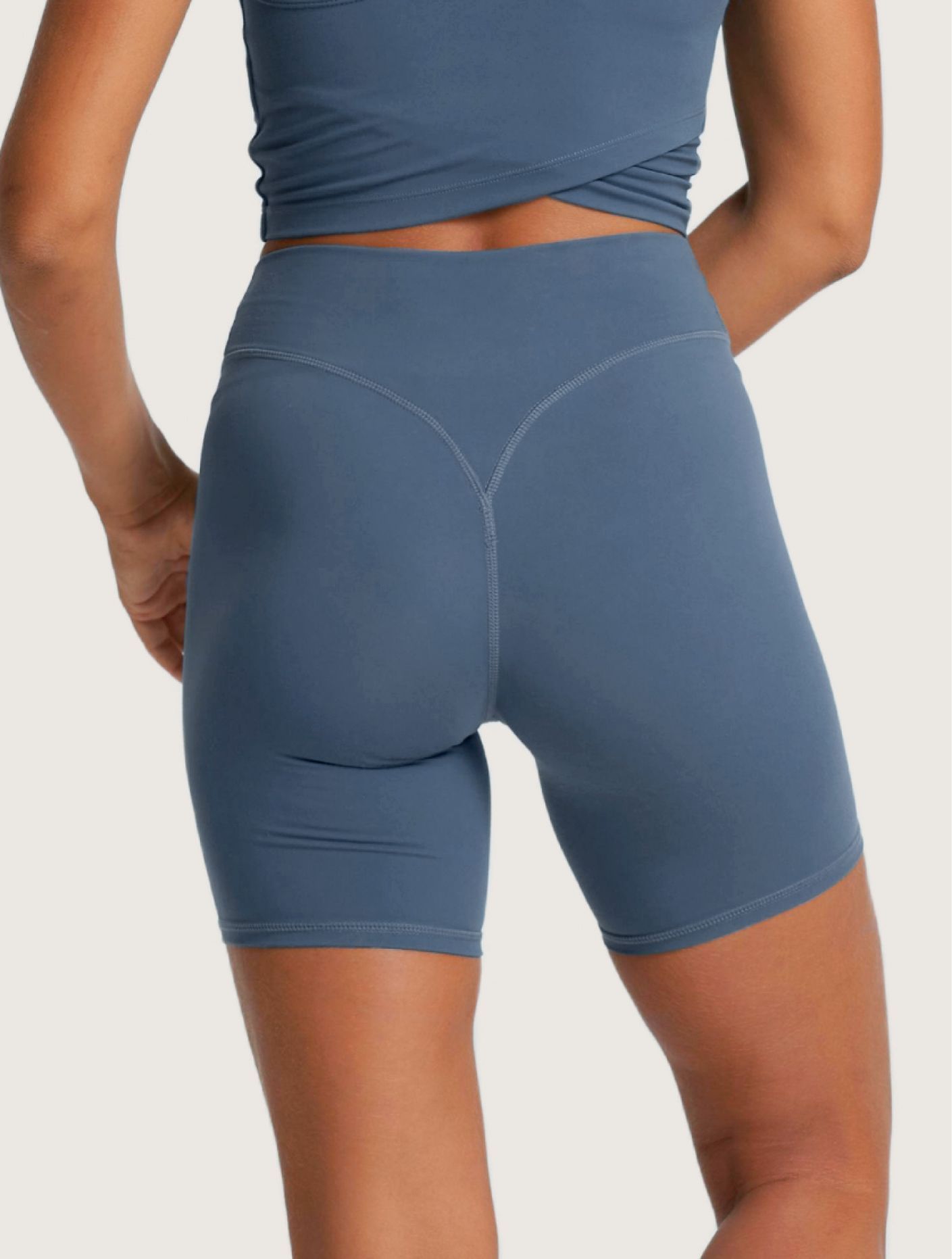  blue athletic shorts and top, 