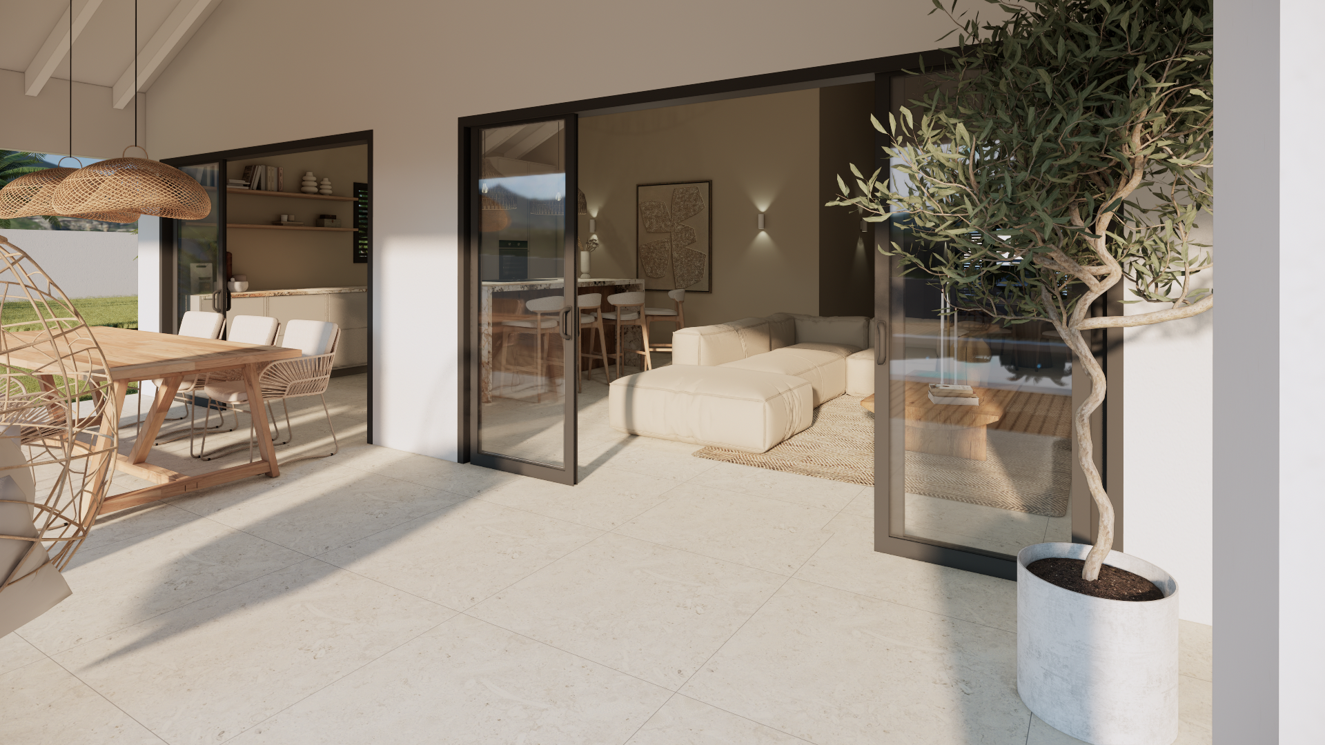 Zonnig, modern terras met openslaande glazen deuren, beige bank, eethoek en olijfbomen in potten.