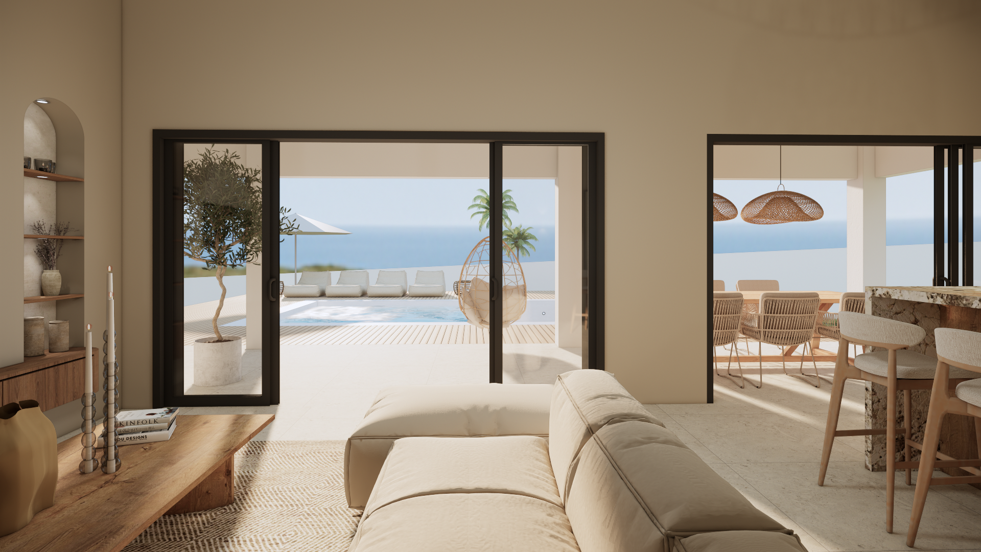 Moderne woonkamer aan het strand met openslaande deuren naar een zonnig uitzicht op de oceaan en een terras met zitgelegenheid.