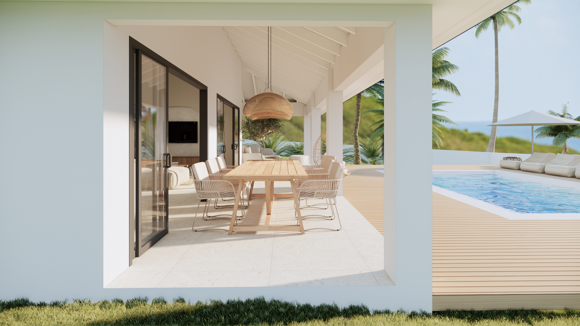 Moderne eethoek op het terras naast een turquoise zwembad met uitzicht op de oceaan, onder een wit overdekt terras.