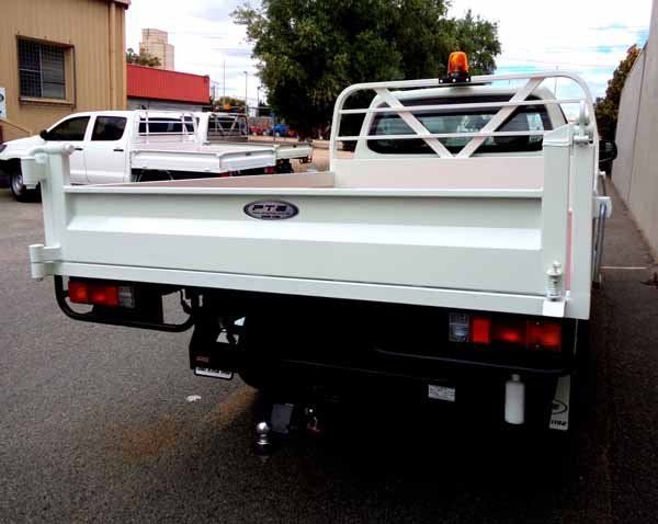 A White Truck Is Parked in A Parking Lot Next to A Building — Welshpool, WA — PTE Group Pty Ltd
