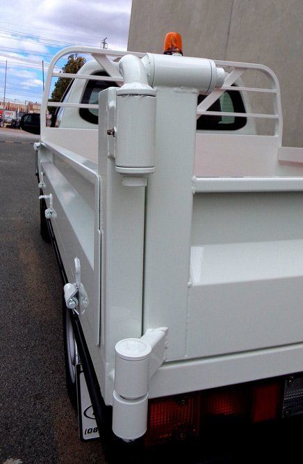 A White Truck with A Light on The Back Is Parked on The Street — Welshpool, WA — PTE Group Pty Ltd