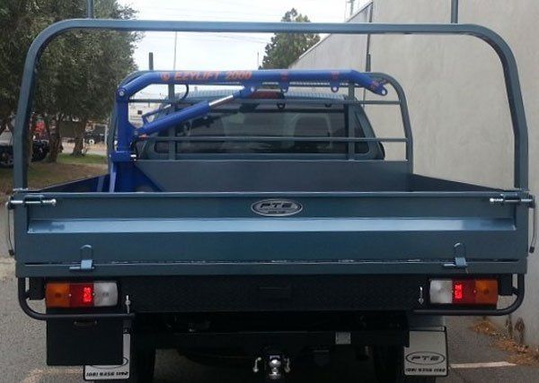 The Back of A Truck with A Crane Attached to It Is Parked in A Parking Lot — Welshpool, WA — PTE Group Pty Ltd