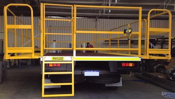 A Truck with A Yellow Platform and Stairs on The Back of It — Welshpool, WA — PTE Group Pty Ltd