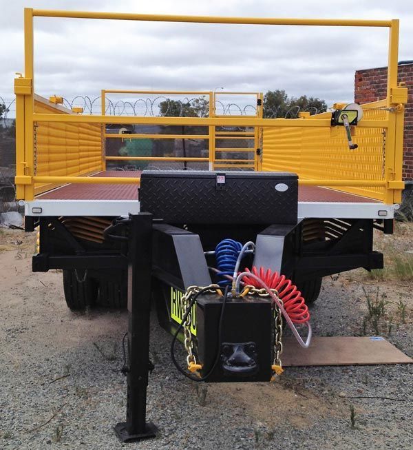 A Yellow Trailer with The Word Big on It — Welshpool, WA — PTE Group Pty Ltd