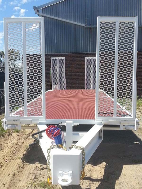 A Red and White Trailer with Chains Attached to It — Welshpool, WA — PTE Group Pty Ltd