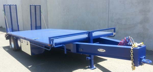 A Blue Trailer Is Parked in Front of A Concrete Wall — Welshpool, WA — PTE Group Pty Ltd