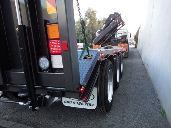 A Truck with A Crane on The Back Is Parked on The Side of The Road — Welshpool, WA — PTE Group Pty Ltd