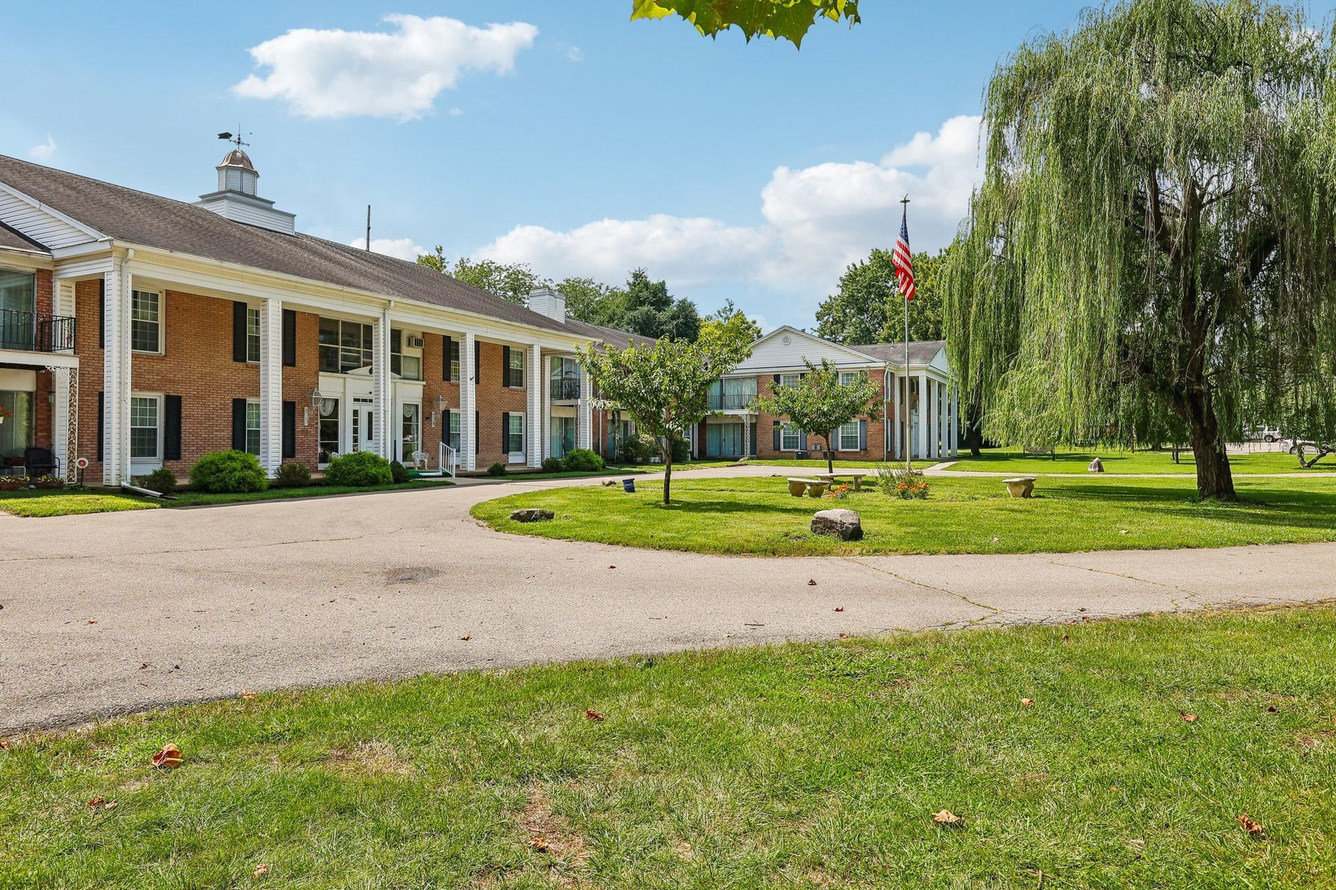 Photo of a circular driveway outside an apartment building