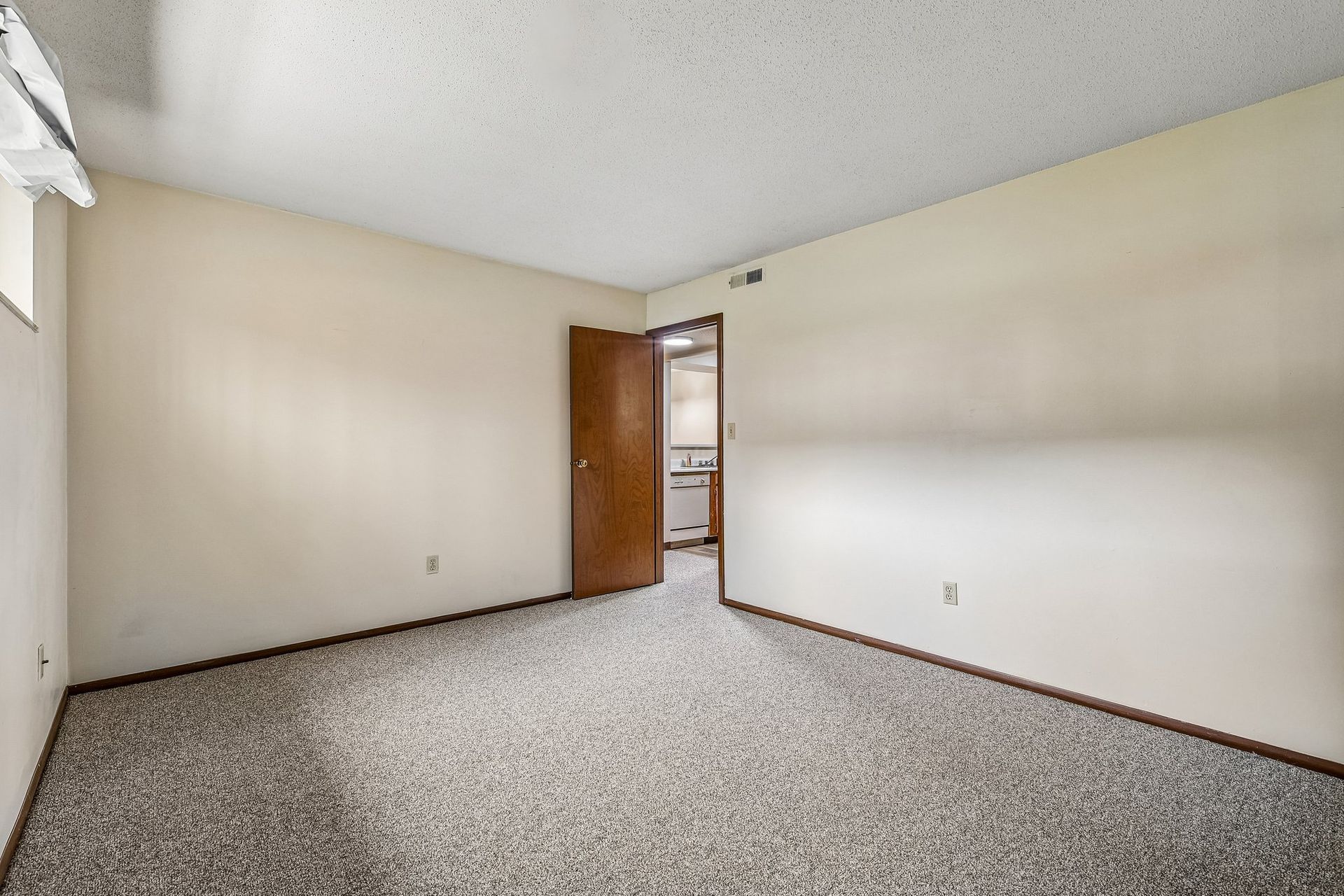 Photo of a room with plenty of natural lighting