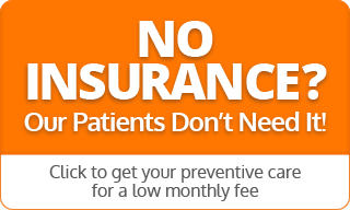 An orange sign that says no insurance our patients don 't need it
