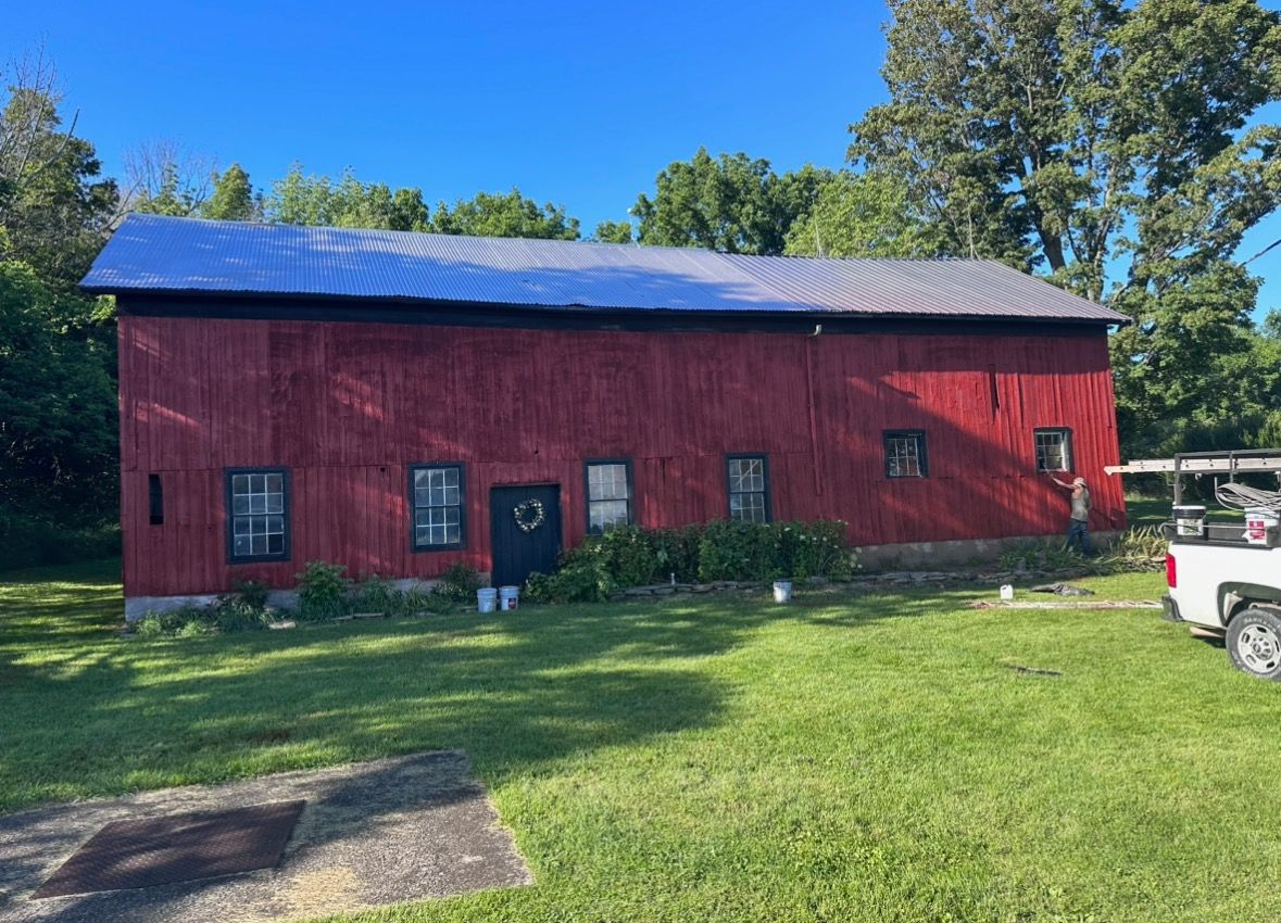 Image of a barn that was just painted in Ogdensburg, New York 