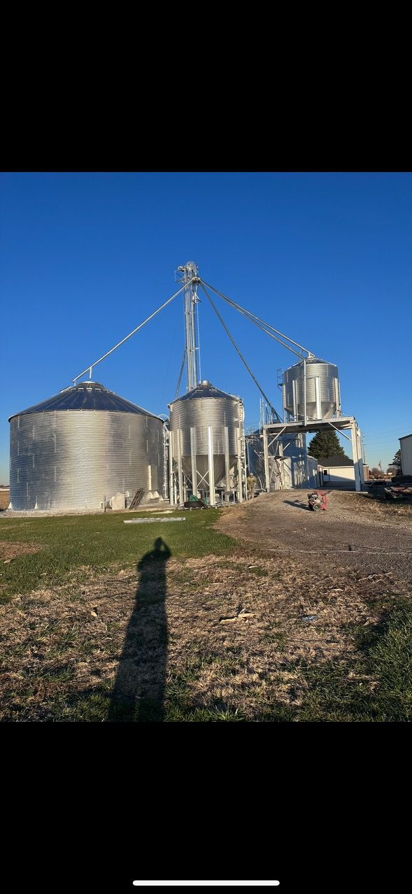 
Image of a couple of grain bins in New York after they got painted by Patrick painting.
