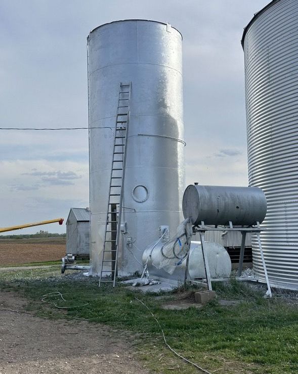 After picture of the same silo but looking brand new now after the silo painting job.