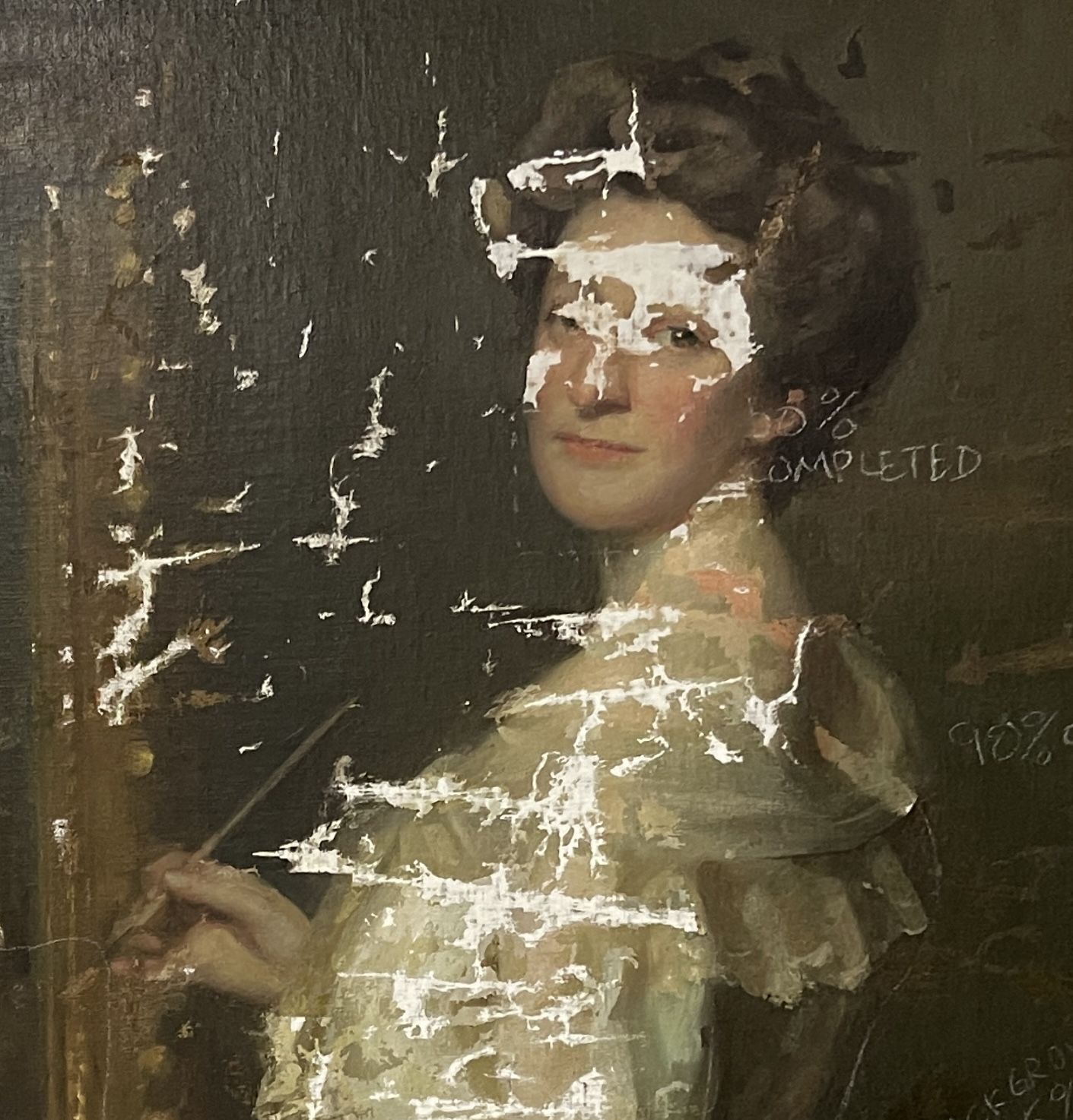 Close-up of painting surface showing age-related cracking evaluated during fine art restoration