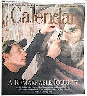 Professional art conservator Scott M. Haskins restoring a large mural, featured on the front page of the LA Times Calendar section.