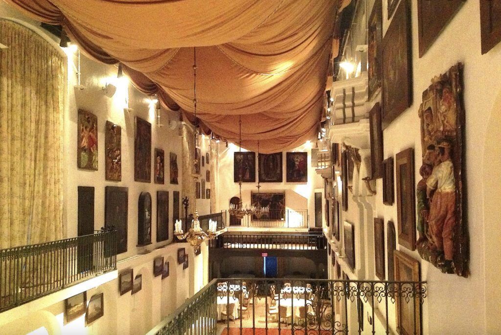 image of painting-covered walls of the Mission Inn in Riverside, CA