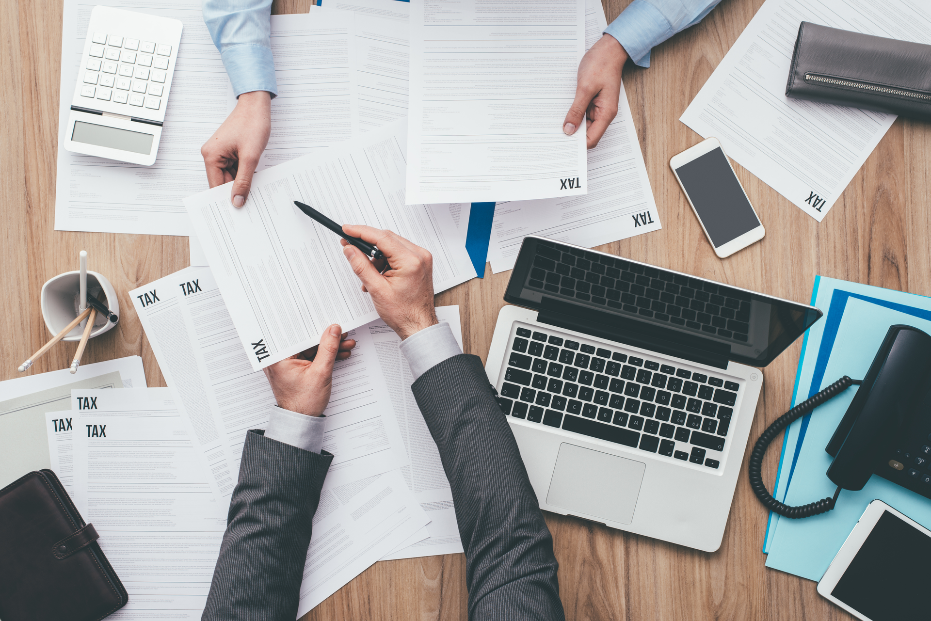 Local tax accountants assisting with business tax preparations.