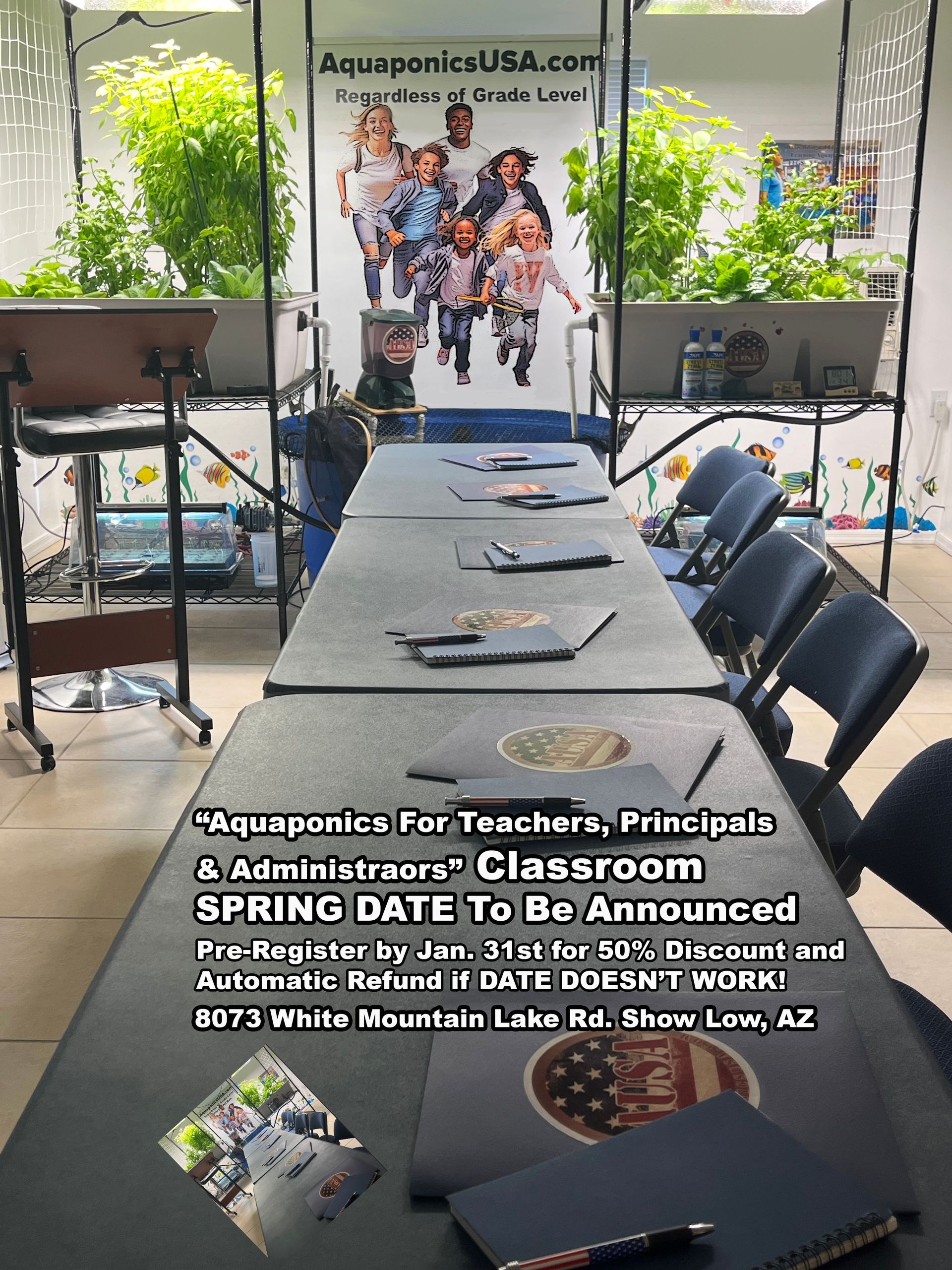 Classroom with tables, aquaponics setup, and sign