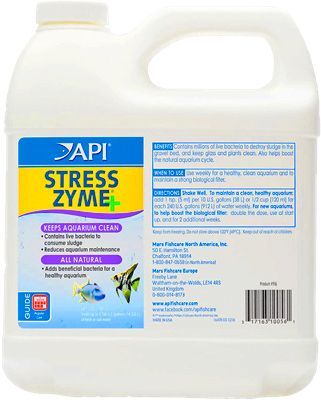 White API Stress Zyme+ aquarium cleaner container with blue, yellow, and green labels.