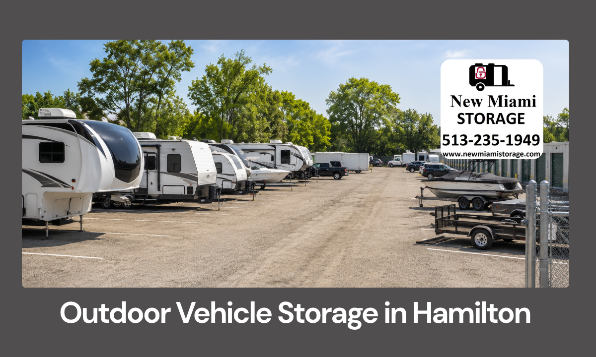 Outdoor vehicle storage lot with RVs, boats, trailers, cars, and trucks parked in Hamilton OH