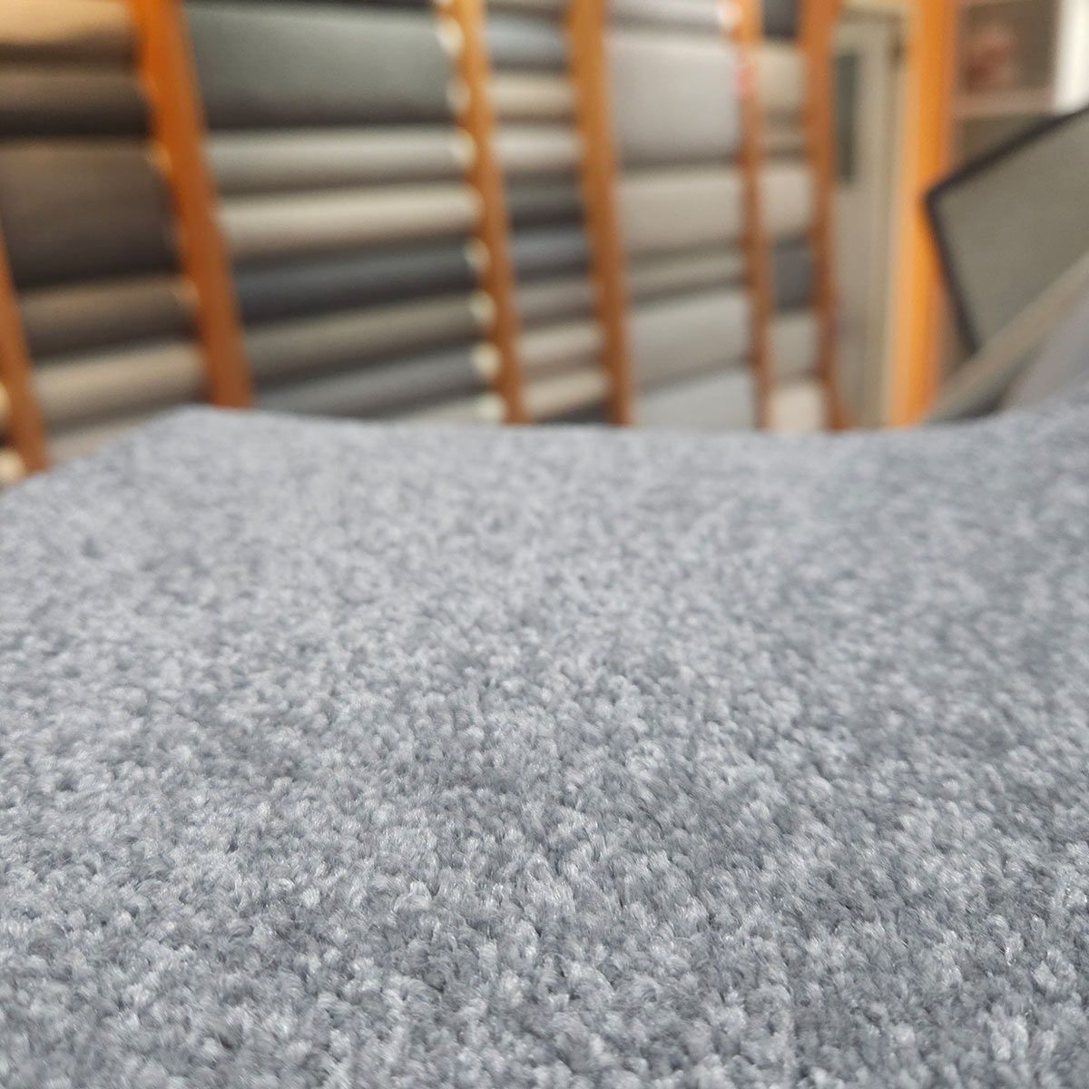 A Close up Of a Grey Carpet in A Store — Kelwin Coastal Carpets In Kundra Park, QLD