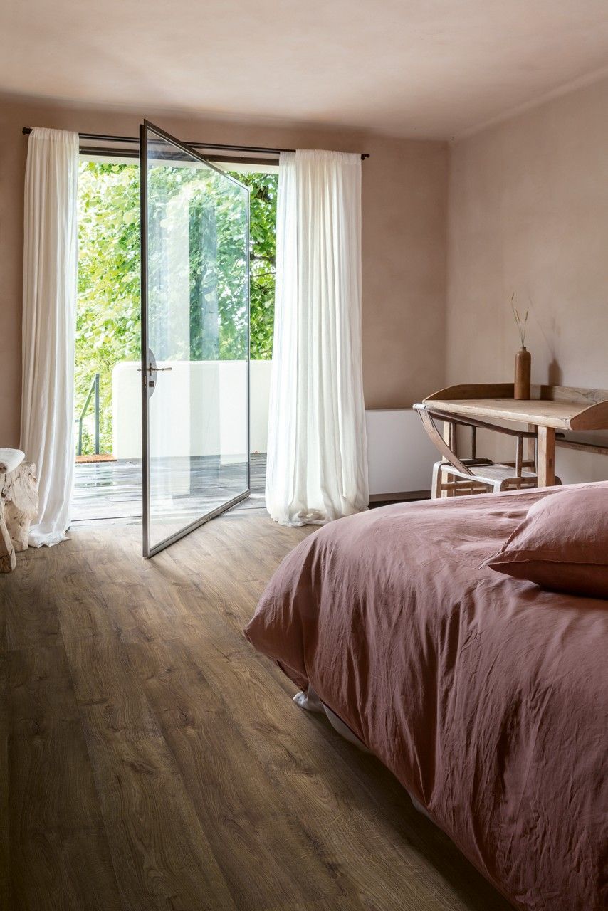 Bright bedroom with open balcony doors — Kelwin Coastal Carpets In Kundra Park, QLD