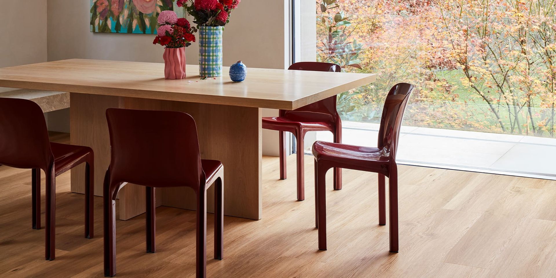 Light wood kitchen with large island, wooden cabinets, and a curved ceiling — Kelwin Coastal Carpets In Kundra Park, QLD
