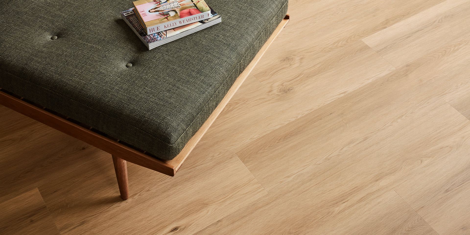 Herringbone wood floor in a modern kitchen with island and open living space — Kelwin Coastal Carpets In Kundra Park, QLD