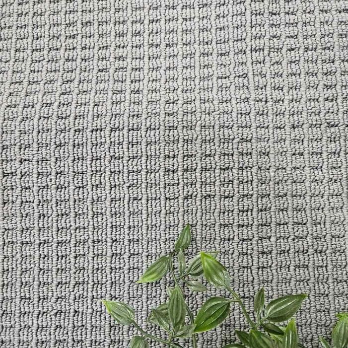 A Close up Of a Rug with A Plant on It — Kelwin Coastal Carpets In Kundra Park, QLD