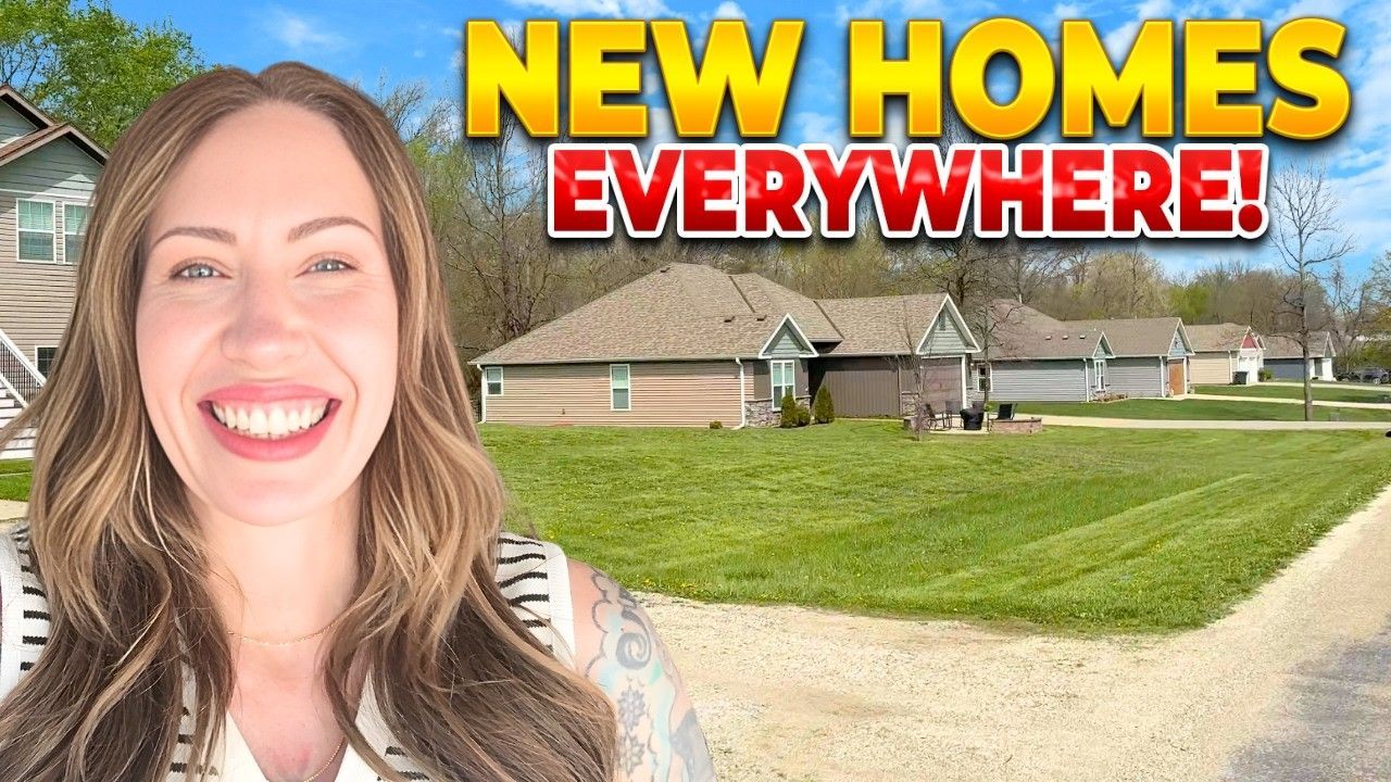 Smiling woman beside suburban homes with bold text “NEW HOMES EVERYWHERE!”