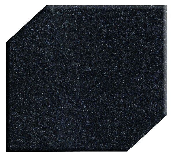 Black granite countertop with angled edges.