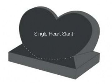 Black granite heart-shaped tombstone with