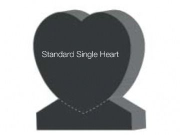 Dark gray heart-shaped monument with base; text: