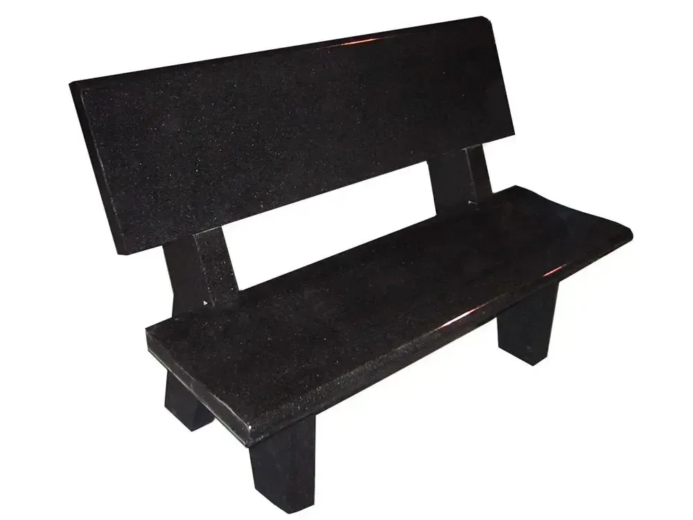 Black, sturdy park bench with a backrest.