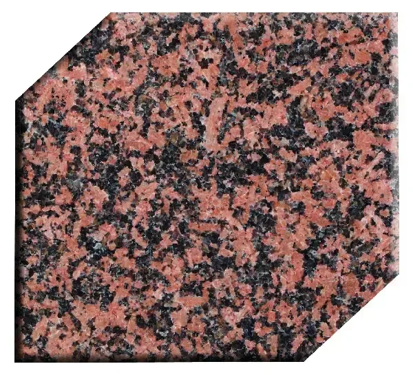 Red granite tile with black speckles, cut with beveled edges.
