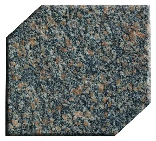 Granite tile with blue-gray and brown speckled pattern, cut with angled edges.