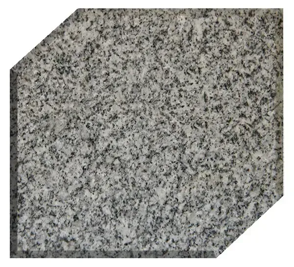 Gray granite tile with beveled corners.