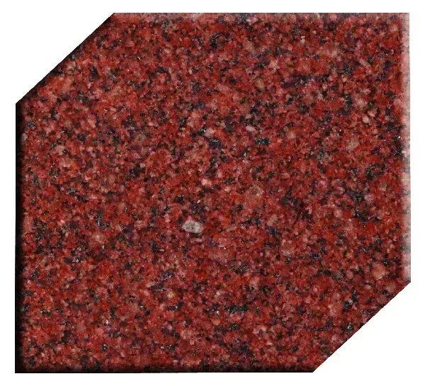 Red granite tile with black and white flecks.