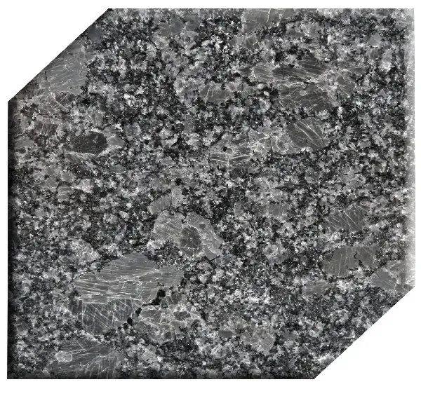 Gray granite surface with speckled patterns and darker patches.