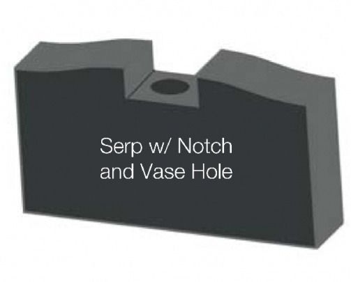 Black block with a notch, a hole, and sloped sides. Label: