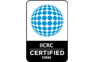 UICRC certified firm logo with blue globe icon above black text on white background