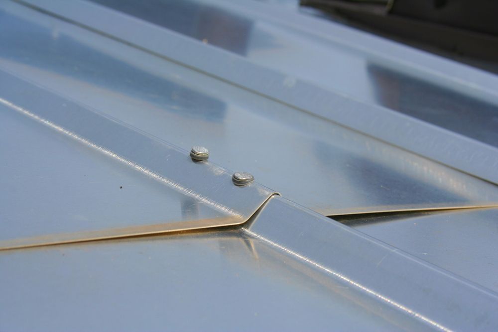 Close Up Picture Of Tin Roof - Plumber in Mount Low, QLD